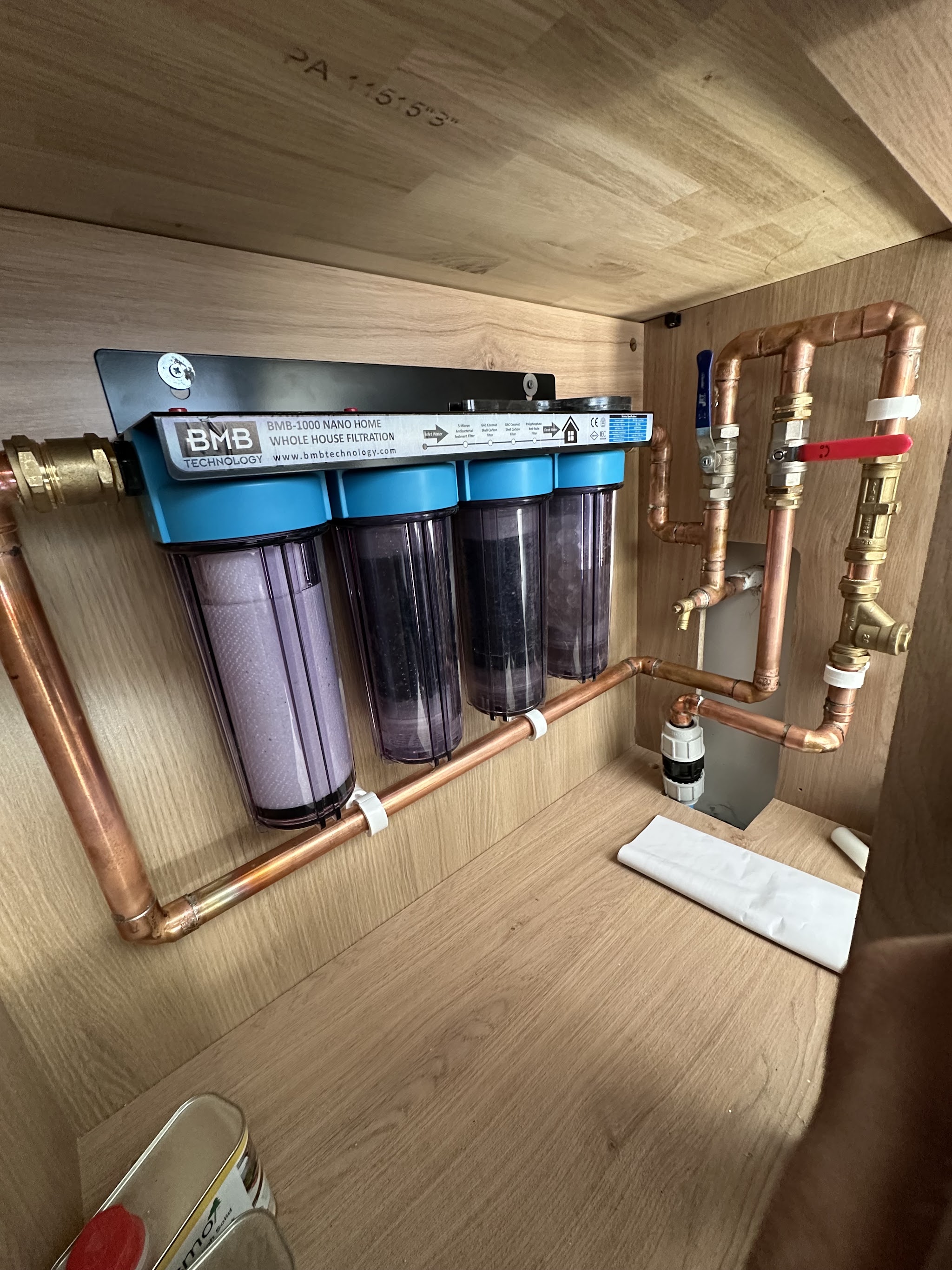 Whole-house water filter unit plumbed in with copper pipework